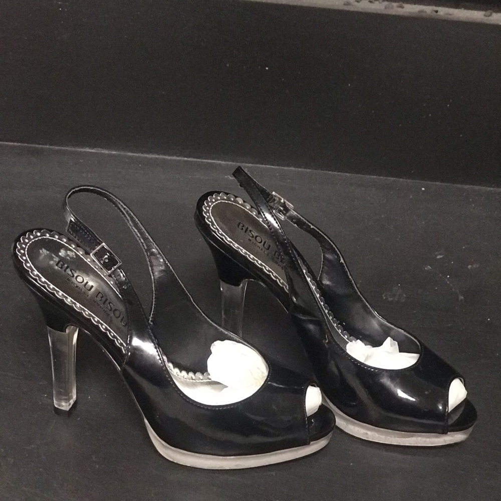 Gently used sling back peep toe heel